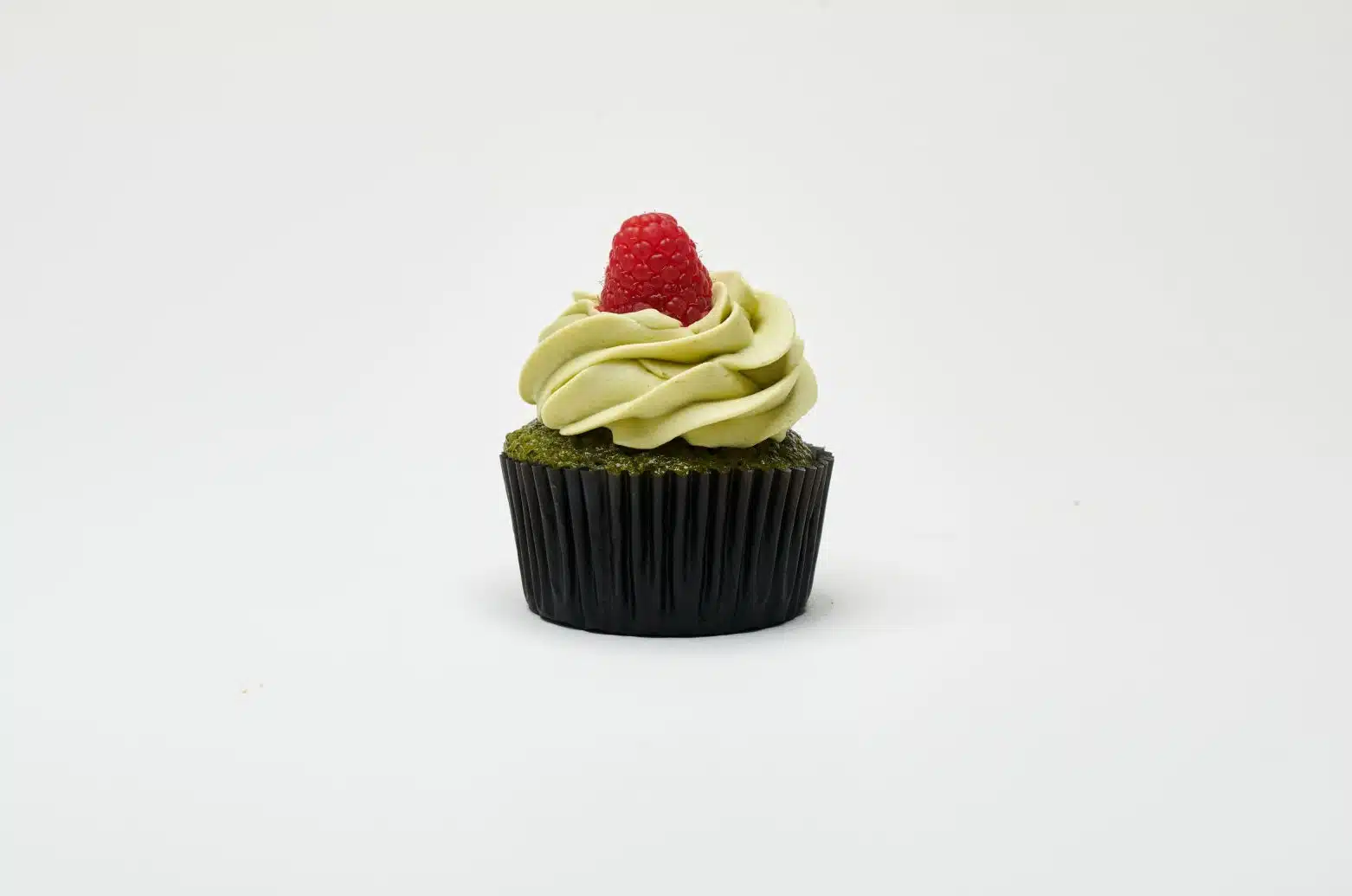 Photo of Organic Matcha Green Tea Cupcake with Raspberry Filling, by Cupcakeology